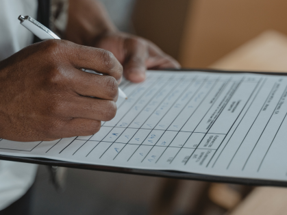 Person holding a clipboard